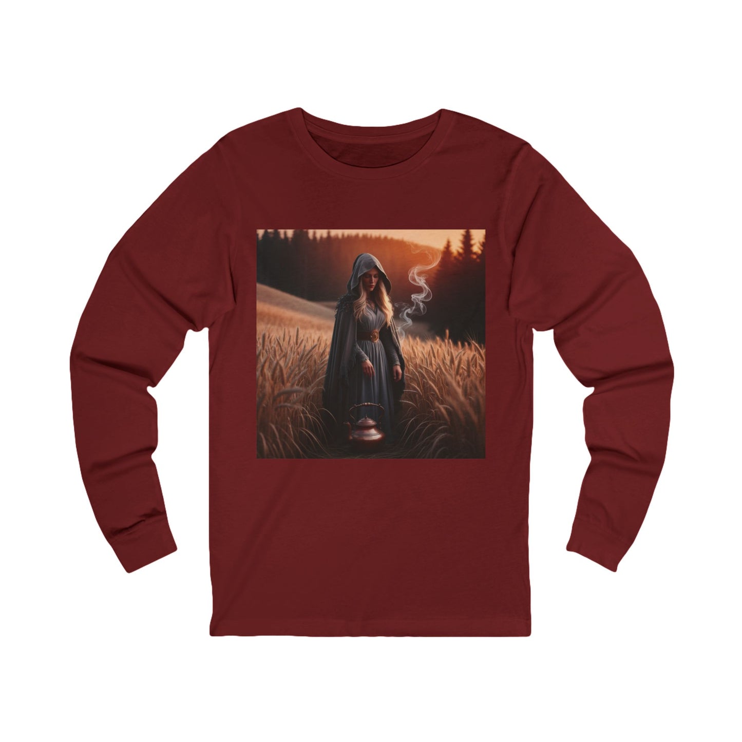 Mystical magic long sleeve tee in cardinal featuring a hooded figure in a field at sunset.