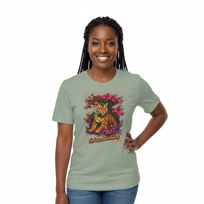 Woman wearing a sage t-shirt with a tiger graphic and text on a white background