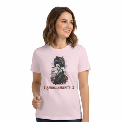 Woman wearing a soft pink t-shirt with a graphic design on a white background